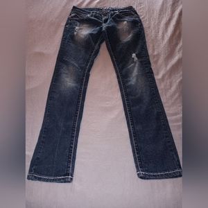 Distressed skinny jeans
